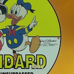 Panneau De La Station-service De Walt Disney Yellow Duck Pour L'essence Standard