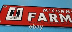 Panneau publicitaire Vintage en porcelaine de la station-service internationale Mccormick Farmall