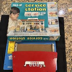Station-service Shell pliable vintage 1969 avec boîte et jouet de station-service, tel que sur les photos